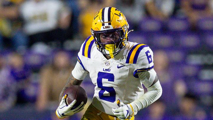 LSU Tigers wide receiver Barion Brown (6) runs against the Western Kentucky Hilltoppers during the second half at Tiger Stadium. LSU Tigers wide receiver Barion Brown (6) runs against the Western Kentucky Hilltoppers during the second half at Tiger Stadium.