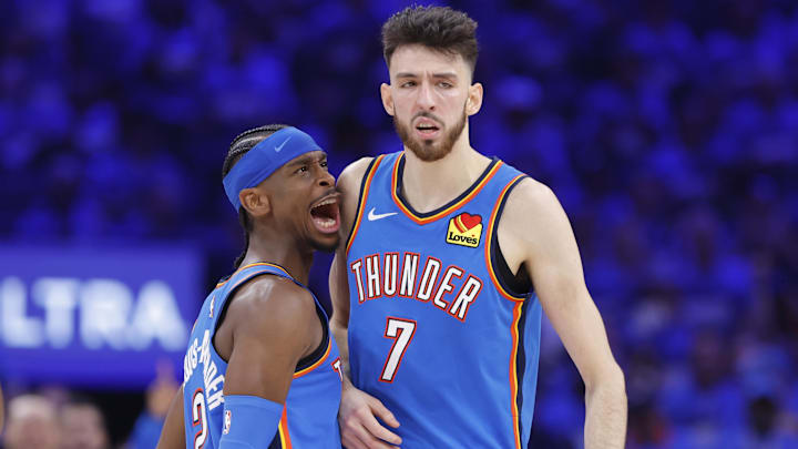 May 22, 2025; Oklahoma City, Oklahoma, USA; Oklahoma City Thunder guard Shai Gilgeous-Alexander (2) and forward Chet Holmgren (7) celebrate after a play against the Minnesota Timberwolves in the third quarter during game two of the western conference finals for the 2025 NBA Playoffs at Paycom Center. Mandatory Credit: Alonzo Adams-Imagn Images