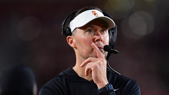 Nov 7, 2025; Los Angeles, California, USA; Southern California Trojans head coach Lincoln Riley watches game action against the Northwestern Wildcats during the second half at the Los Angeles Memorial Coliseum. Mandatory Credit: Gary A. Vasquez-Imagn Images