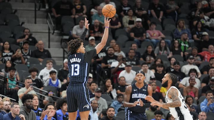 Orlando Magic guard Jett Howard (13) shoots over San Antonio Spurs forward Julian Champagnie (30) in the first half at Frost Bank Center.