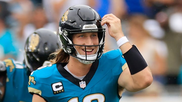 Jacksonville Jaguars quarterback Trevor Lawrence (16) smiles after wide receiver Christian Kirk (13), not shown, caught a reception during the fourth quarter of an NFL football matchup Sunday, Oct. 6, 2024 at EverBank Stadium in Jacksonville, Fla. The Jaguars edged the Colts on a field goal 37-34. [Corey Perrine/Florida Times-Union]