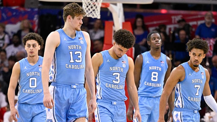 Jan 3, 2026; Dallas, Texas, USA; North Carolina Tar Heels guard Kyan Evans (0) and center Henri Veesaar (13) and guard Derek Dixon (3) and forward Caleb Wilson (8) and guard Seth Trimble (7) come back on the court during the second half against the SMU Mustangs at Moody Coliseum. Mandatory Credit: Jerome Miron-Imagn Images Jan 3, 2026; Dallas, Texas, USA; North Carolina Tar Heels guard Kyan Evans (0) and center Henri Veesaar (13) and guard Derek Dixon (3) and forward Caleb Wilson (8) and guard Seth Trimble (7) come back on the court during the second half against the SMU Mustangs at Moody Coliseum. Mandatory Credit: Jerome Miron-Imagn Images