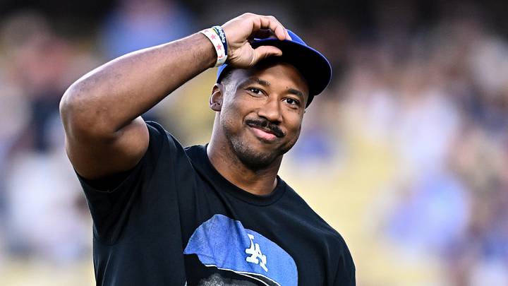 New Los Angeles Rams defensive end Myles Garrett looks on prior to throwing out honorary first pitch before a Dodgers game New Los Angeles Rams defensive end Myles Garrett looks on prior to throwing out honorary first pitch before a Dodgers game