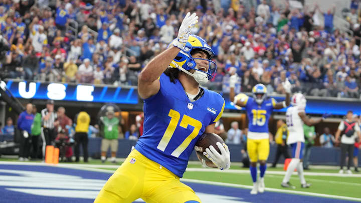 Dec 8, 2024; Inglewood, California, USA; Los Angeles Rams wide receiver Puka Nacua (17) celebrates scores on a 4-yard touchdown run in the second quarter against the Buffalo Bills  at SoFi Stadium. Mandatory Credit: Kirby Lee-Imagn Images