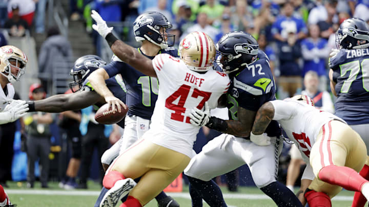 Sep 7, 2025; Seattle, Washington, USA; Seattle Seahawks quarterback Sam Darnold (14) looks to make a pass against San Francisco 49ers during the first half at Lumen Field. Mandatory Credit: Joe Nicholson-Imagn Images Sep 7, 2025; Seattle, Washington, USA; Seattle Seahawks quarterback Sam Darnold (14) looks to make a pass against San Francisco 49ers during the first half at Lumen Field. Mandatory Credit: Joe Nicholson-Imagn Images