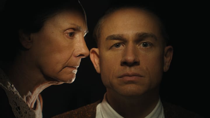 (L to R) Laurie Metcalf as Augusta Gein, Charlie Hunnam as Ed Gein in episode 307 of Monster: The Ed Gein Story