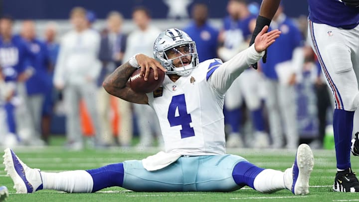 Dallas Cowboys quarterback Dak Prescott reacts after a play against the New York Giants during overtime. Dallas Cowboys quarterback Dak Prescott reacts after a play against the New York Giants during overtime.