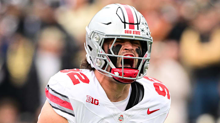 Nov 8, 2025; West Lafayette, Indiana, USA;  Ohio State Buckeyes defensive end Caden Curry (92) celebrates after making a play during the first quarter against the Purdue Boilermakers at Ross-Ade Stadium. Mandatory Credit: Marc Lebryk-Imagn Images