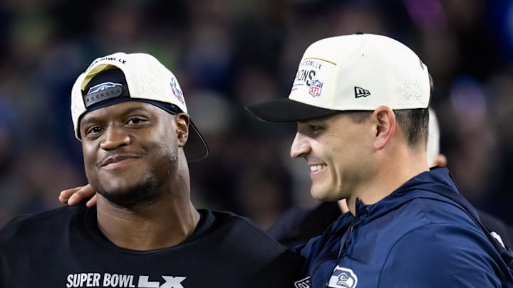 Seattle Seahawks head coach Mike Macdonald and running back Kenneth Walker III celebrate