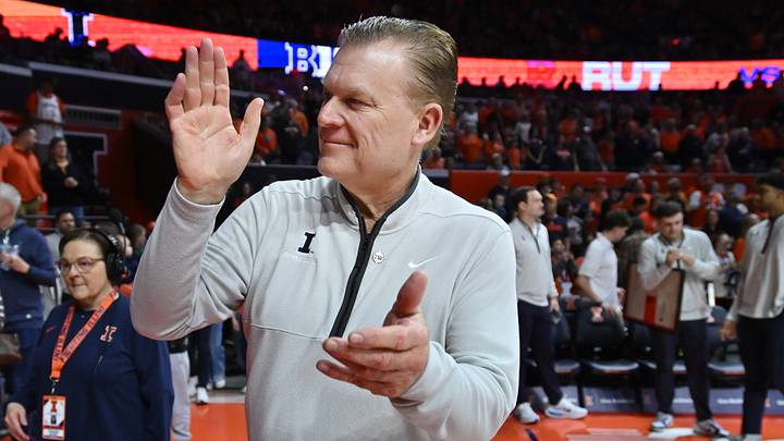 Jan 8, 2026; Champaign, Illinois, USA; Illinois Fighting Illini head coach Brad Underwood greets the crowd before he first half against the Rutgers Scarlet Knights at State Farm Center. Mandatory Credit: Ron Johnson-Imagn Images Jan 8, 2026; Champaign, Illinois, USA; Illinois Fighting Illini head coach Brad Underwood greets the crowd before he first half against the Rutgers Scarlet Knights at State Farm Center. Mandatory Credit: Ron Johnson-Imagn Images
