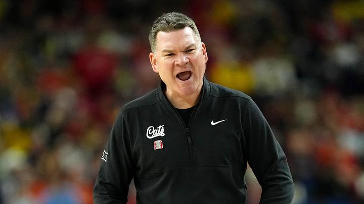 Apr 4, 2026; Indianapolis, IN, USA; Arizona Wildcats head coach Tommy Lloyd reacts during the second half in a semifinal of the Final Four of the men's 2026 NCAA Tournament at Lucas Oil Stadium. Mandatory Credit: Bob Donnan-Imagn Images Apr 4, 2026; Indianapolis, IN, USA; Arizona Wildcats head coach Tommy Lloyd reacts during the second half in a semifinal of the Final Four of the men's 2026 NCAA Tournament at Lucas Oil Stadium. Mandatory Credit: Bob Donnan-Imagn Images