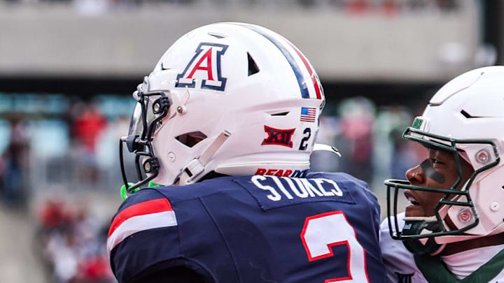 Nov 22, 2025; Tucson, Arizona, USA; Arizona Wildcats defensive back Treydan Stukes (2) intercepts the ball in the end zone during the fourth quarter of the game against the Baylor Bears at Casino Del Sol Stadium. Mandatory Credit: Aryanna Frank-Imagn Images