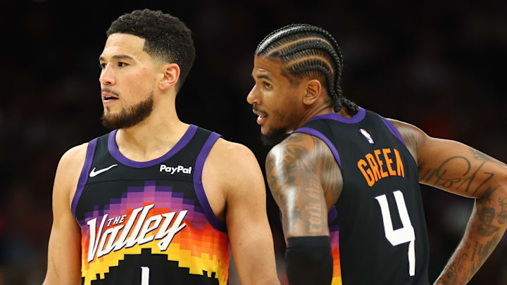 Apr 7, 2026; Phoenix, Arizona, USA; Phoenix Suns guard Devin Booker (1) and Jalen Green (4) against the Houston Rockets in the second half at Mortgage Matchup Center. Mandatory Credit: Mark J. Rebilas-Imagn Images
