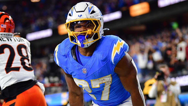 Nov 17, 2024; Inglewood, California, USA; Los Angeles Chargers running back J.K. Dobbins (27) celebrates his touchdown scored against the Cincinnati Bengals during the second half at SoFi Stadium. Mandatory Credit: Gary A. Vasquez-Imagn Images Nov 17, 2024; Inglewood, California, USA; Los Angeles Chargers running back J.K. Dobbins (27) celebrates his touchdown scored against the Cincinnati Bengals during the second half at SoFi Stadium. Mandatory Credit: Gary A. Vasquez-Imagn Images