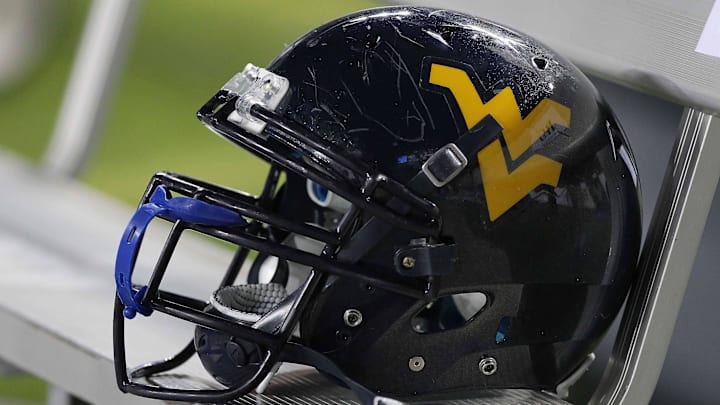 December 1, 2011; Tampa, FL, USA; West Virginia Mountaineers helmet on the bench during the second half against the South Florida Bulls at Raymond James Stadium. West Virginia Mountaineers defeated the South Florida Bulls 30-27. Mandatory Credit: Kim Klement-Imagn Images