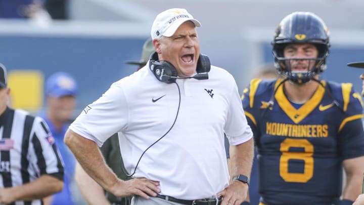 West Virginia Mountaineers head coach Rich Rodriguez West Virginia Mountaineers head coach Rich Rodriguez