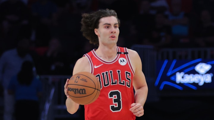 Chicago Bulls guard Josh Giddey dribbles the basketball against the Miami Heat during the first quarter at Kaseya Center. Mandatory Credit: Sam Navarro-Imagn Images