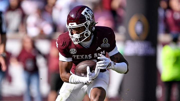 Texas A&M Aggies wide receiver Terry Bussey (2) runs with the ball during the game between the Aggies and the Hurricanes at Kyle Field. 