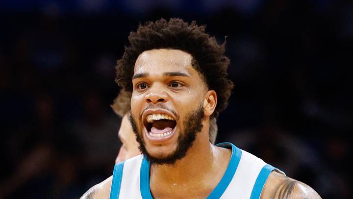 Orlando, Florida, USA;  Charlotte Hornets forward Miles Bridges (0) reacts after scoring a basket against the Orlando Magic late in the fourth quarter at Amway Center on Oct 27, 2021.