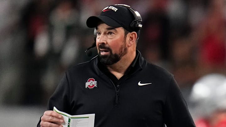 Ohio State Buckeyes head coach Ryan Day watches from the sideline during the Cotton Bowl at AT&T Stadium in Arlington, Texas for the College Football Playoff quarterfinal game against the Miami Hurricanes on Dec. 31, 2025.