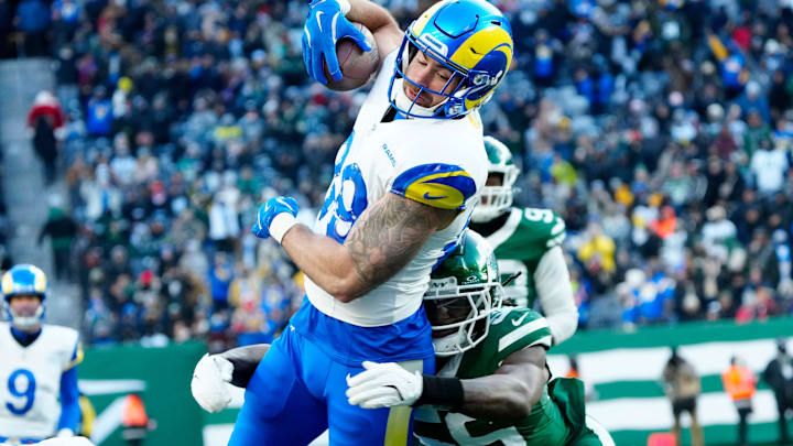 Los Angeles Rams tight end Tyler Higbee (89) scores a touchdown in the fourth quarter, despite the defense of New York Jets linebacker Quincy Williams (56), Sunday, December 22, 2024, in East Rutherford. Los Angeles Rams tight end Tyler Higbee (89) scores a touchdown in the fourth quarter, despite the defense of New York Jets linebacker Quincy Williams (56), Sunday, December 22, 2024, in East Rutherford.