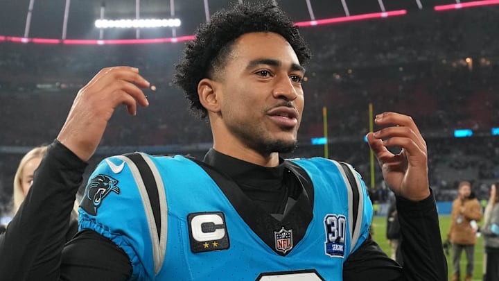 Nov 10, 2024; Munich, Germany; Carolina Panthers quarterback Bryce Young (9) reacts after the game against the New York Giants during the 2024 NFL Munich Game at Allianz Arena. Mandatory Credit: Kirby Lee-Imagn Images