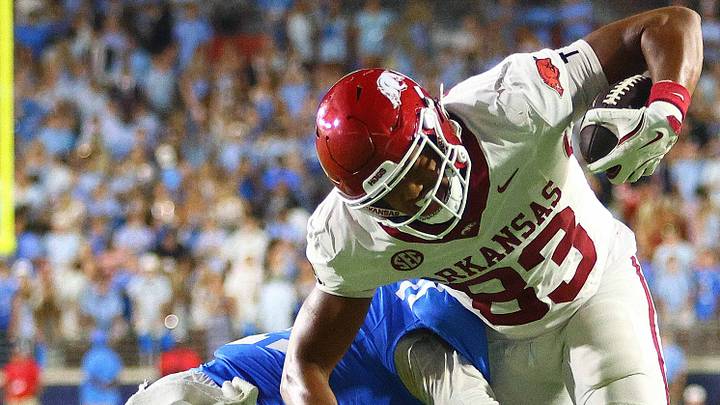 Sep 13, 2025; Oxford, Mississippi, USA; Arkansas Razorback tight end Jaden Platt (83) runs after a catch as Mississippi Rebels defensive back Kapena Gushiken (14) make the tackle during the fourth quarter at Vaught-Hemingway Stadium. Mandatory Credit: Petre Thomas-Imagn Images Sep 13, 2025; Oxford, Mississippi, USA; Arkansas Razorback tight end Jaden Platt (83) runs after a catch as Mississippi Rebels defensive back Kapena Gushiken (14) make the tackle during the fourth quarter at Vaught-Hemingway Stadium. Mandatory Credit: Petre Thomas-Imagn Images