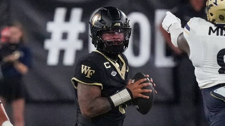 Wake Forest Demon Deacons quarterback Gio Lopez (3) drops back to pass Mandatory Credit: Jim Dedmon-Imagn Images