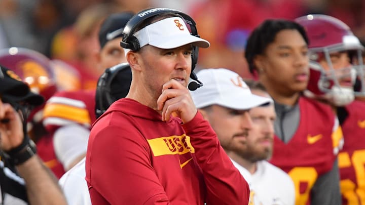 Nov 16, 2024; Los Angeles, California, USA; Southern California Trojans head coach Lincoln Riley watches game action against the Nebraska Cornhuskers during the second half at the Los Angeles Memorial Coliseum. Mandatory Credit: Gary A. Vasquez-Imagn Images
