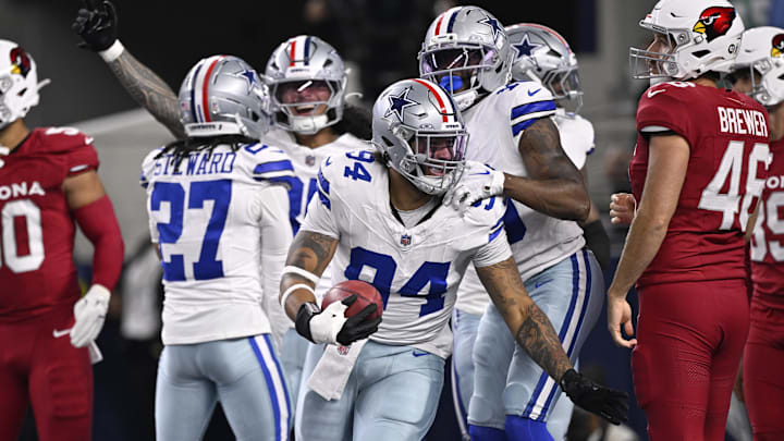 Dallas Cowboys defensive end Marshawn Kneeland celebrates after recovering a blocked punt for a TD against the Arizona Cardinals