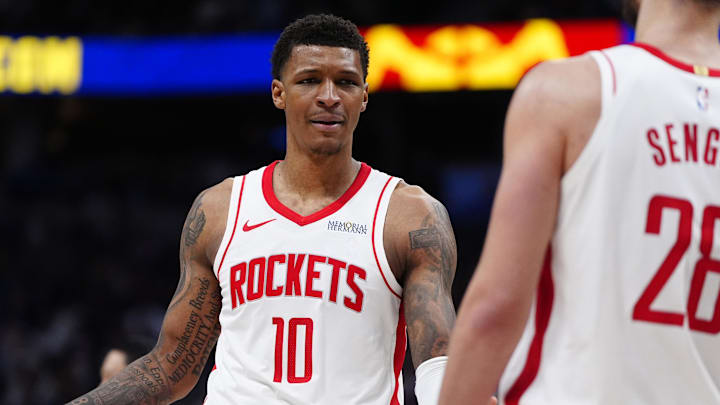 Mar 11, 2026; Denver, Colorado, USA; Houston Rockets forward Jabari Smith Jr. (10) reacts in the second half against the Denver Nuggets at Ball Arena. Mandatory Credit: Ron Chenoy-Imagn Images