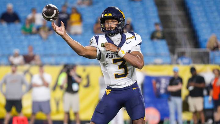 Sep 19, 2026; Charlotte, North Carolina, USA; West Virginia Mountaineers quarterback Michael Hawkins Jr. (3) throws a pass during the fourth quarter against the Virginia Cavaliers at Bank of America Stadium. Mandatory Credit: Ben Queen-Imagn Images Sep 19, 2026; Charlotte, North Carolina, USA; West Virginia Mountaineers quarterback Michael Hawkins Jr. (3) throws a pass during the fourth quarter against the Virginia Cavaliers at Bank of America Stadium. Mandatory Credit: Ben Queen-Imagn Images