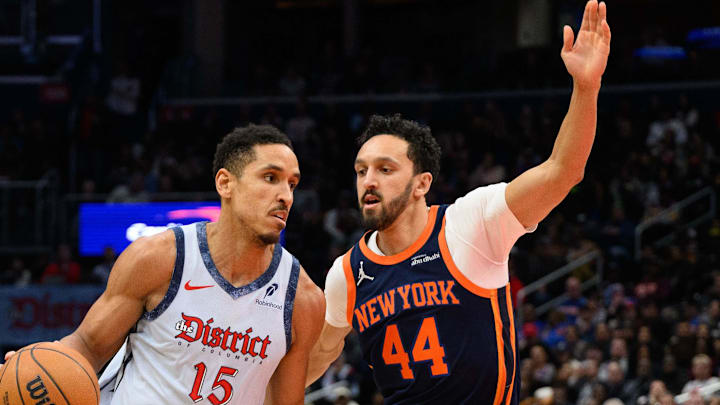 Washington Wizards guard Malcolm Brogdon drives to the basket as New York Knicks guard Landry Shamet defends. Washington Wizards guard Malcolm Brogdon drives to the basket as New York Knicks guard Landry Shamet defends.