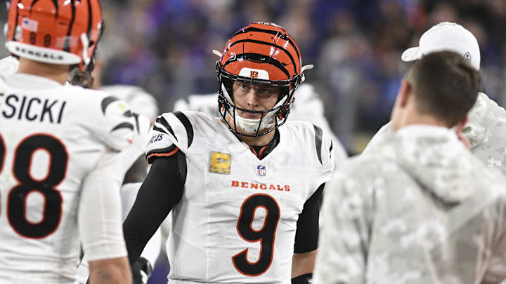 Nov 7, 2024; Baltimore, Maryland, USA; Cincinnati Bengals quarterback Joe Burrow (9) celebrates with teammates after throwing a touchdown  during the second half against the Baltimore Ravens   at M&T Bank Stadium. Mandatory Credit: Tommy Gilligan-Imagn Images