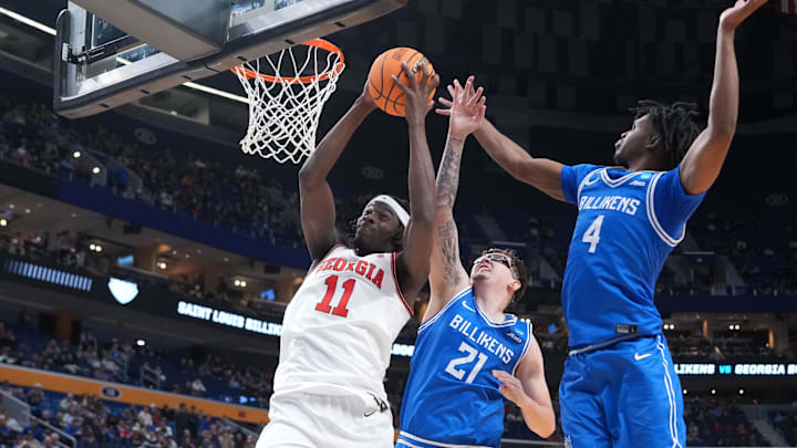 Mar 19, 2026; Buffalo, NY, USA; Georgia Bulldogs forward Dylan James (11) vies for a rebound against Saint Louis Billikens center Robbie Avila (21) and guard Amari McCottry (4) during the second half of a first round game of the men's 2026 NCAA Tournament at Keybank Center. Mandatory Credit: Gregory Fisher-Imagn Images