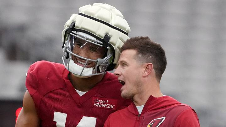 Arizona Cardinals head coach Mike LaFleur talks to Michael Wilson during training camp at State Farm Stadium in Glendale on Aug 2, 2026. Arizona Cardinals head coach Mike LaFleur talks to Michael Wilson during training camp at State Farm Stadium in Glendale on Aug 2, 2026.