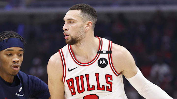 Jan 10, 2025; Chicago, Illinois, USA; Chicago Bulls guard Zach LaVine (8) drives to the basket against Washington Wizards guard Bilal Coulibaly (0) during the first half at United Center. Mandatory Credit: Kamil Krzaczynski-Imagn Images