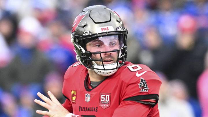 Nov 16, 2025; Orchard Park, New York, USA;  Tampa Bay Buccaneers quarterback Baker Mayfield (6) scrambles against the Buffalo Bills during the second quarter of the game at Highmark Stadium. Mandatory Credit: Mark Konezny-Imagn Images