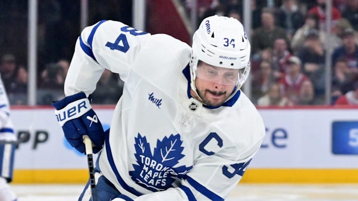 Mar 10, 2026; Montreal, Quebec, CAN; Toronto Maple Leafs forward Auston Matthews (34) plays the puck during the third period against the Montreal Canadiens at the Bell Centre. Mandatory Credit: Eric Bolte-Imagn Images