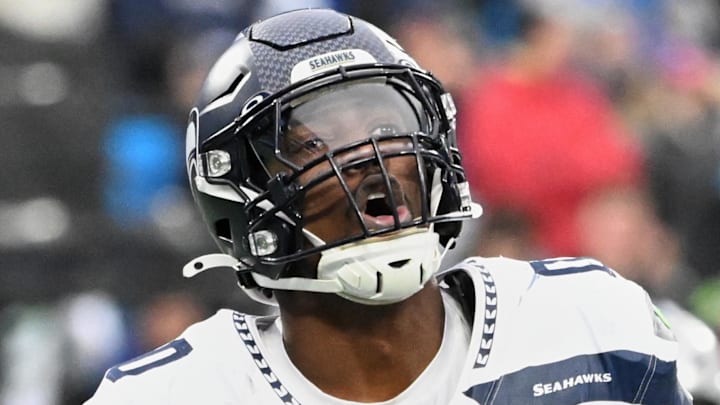 Dec 28, 2025; Charlotte, North Carolina, USA; Seattle Seahawks defensive end DeMarcus Lawrence (0) reacts against the Carolina Panthers during the fourth quarter at Bank of America Stadium. Mandatory Credit: Bob Donnan-Imagn Images