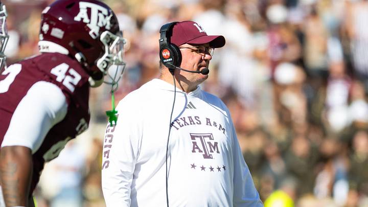 Nov 22, 2025; College Station, Texas, USA; Texas A&M Aggies head coach Mike Elko on the field in the second half of a game against the Samford Bulldogs at Kyle Field. Mandatory Credit: Joseph Buvid-Imagn Images Nov 22, 2025; College Station, Texas, USA; Texas A&M Aggies head coach Mike Elko on the field in the second half of a game against the Samford Bulldogs at Kyle Field. Mandatory Credit: Joseph Buvid-Imagn Images