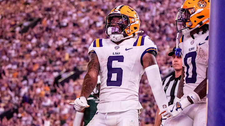 Sep 20, 2025; Baton Rouge, Louisiana, USA;  LSU Tigers wide receiver Barion Brown (6) reacts to scoring a touchdown against the Southeastern Louisiana Lions during the first half at Tiger Stadium. Mandatory Credit: Stephen Lew-Imagn Images