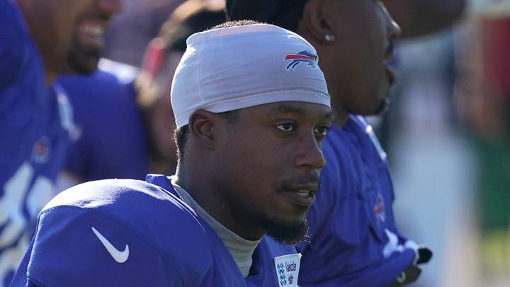 Bills wide receiver Joshua Palmer stretches with a band during warm ups at Bills Training Camp at St. John Fisher University in Pittsford on Aug. 4, 2026.