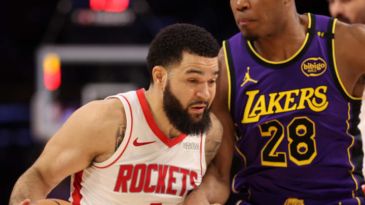 Mar 31, 2025; Los Angeles, California, USA;  Houston Rockets guard Fred VanVleet (5) drives to the basket against Los Angeles Lakers forward Rui Hachimura (28) during the third quarter at Crypto.com Arena. Mandatory Credit: Kiyoshi Mio-Imagn Images
