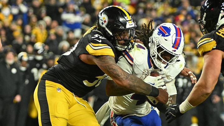 Nov 30, 2025; Pittsburgh, Pennsylvania, USA; Pittsburgh Steelers linebacker Malik Harrison (50) tackles Buffalo Bills running back James Cook III (4) during the second half at Acrisure Stadium. Mandatory Credit: Barry Reeger-Imagn Images Nov 30, 2025; Pittsburgh, Pennsylvania, USA; Pittsburgh Steelers linebacker Malik Harrison (50) tackles Buffalo Bills running back James Cook III (4) during the second half at Acrisure Stadium. Mandatory Credit: Barry Reeger-Imagn Images