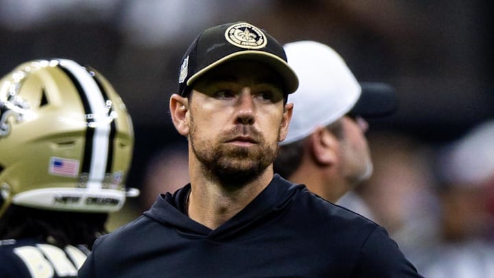Aug 25, 2024; New Orleans, Louisiana, USA;  New Orleans Saints offensive coordinator Klint Kubiak during the warmups before the game against the Tennessee Titans at Caesars Superdome. Mandatory Credit: Stephen Lew-Imagn Images