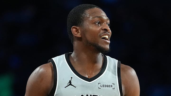 Dec 16, 2025; Las Vegas, Nevada, USA; San Antonio Spurs guard De'Aaron Fox (4) reacts against the New York Knicks during the Emirates NBA Cup Final at T-Mobile Arena. Mandatory Credit: Kirby Lee-Imagn Images