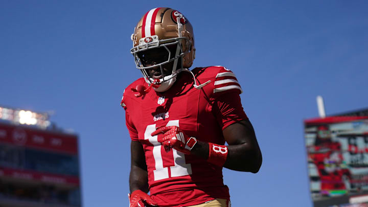 Oct 20, 2024; Santa Clara, California, USA; San Francisco 49ers wide receiver Brandon Aiyuk (11) walks on the field before the start of the game against the Kansas City Chiefs at Levi's Stadium. Mandatory Credit: Cary Edmondson-Imagn Images Oct 20, 2024; Santa Clara, California, USA; San Francisco 49ers wide receiver Brandon Aiyuk (11) walks on the field before the start of the game against the Kansas City Chiefs at Levi's Stadium. Mandatory Credit: Cary Edmondson-Imagn Images