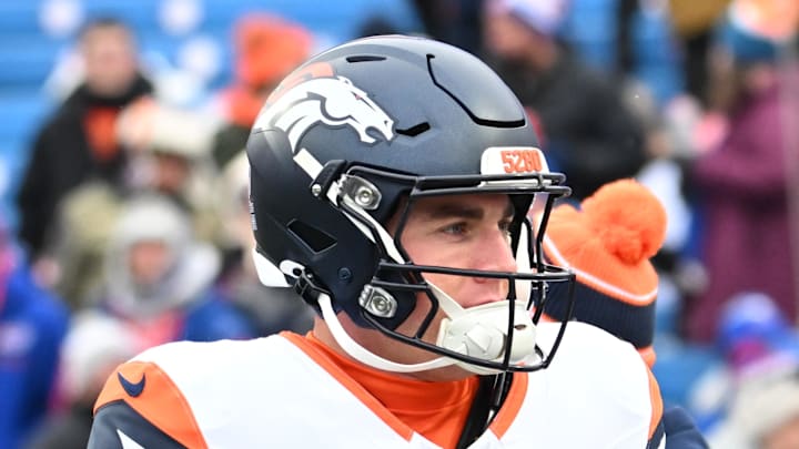 Jan 12, 2025; Orchard Park, New York, USA; Denver Broncos quarterback Bo Nix (10) warms up before a game against the Buffalo Bills in an AFC wild card game at Highmark Stadium. Mandatory Credit: Mark Konezny-Imagn Images