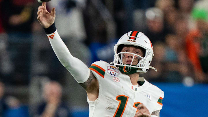 Miami Hurricanes quarterback Carson Beck (11) throws during the CFP Fiesta Bowl against Miami at the State Farm Stadium, in Glendale, Ariz., on Thursday, Jan. 8, 2026.